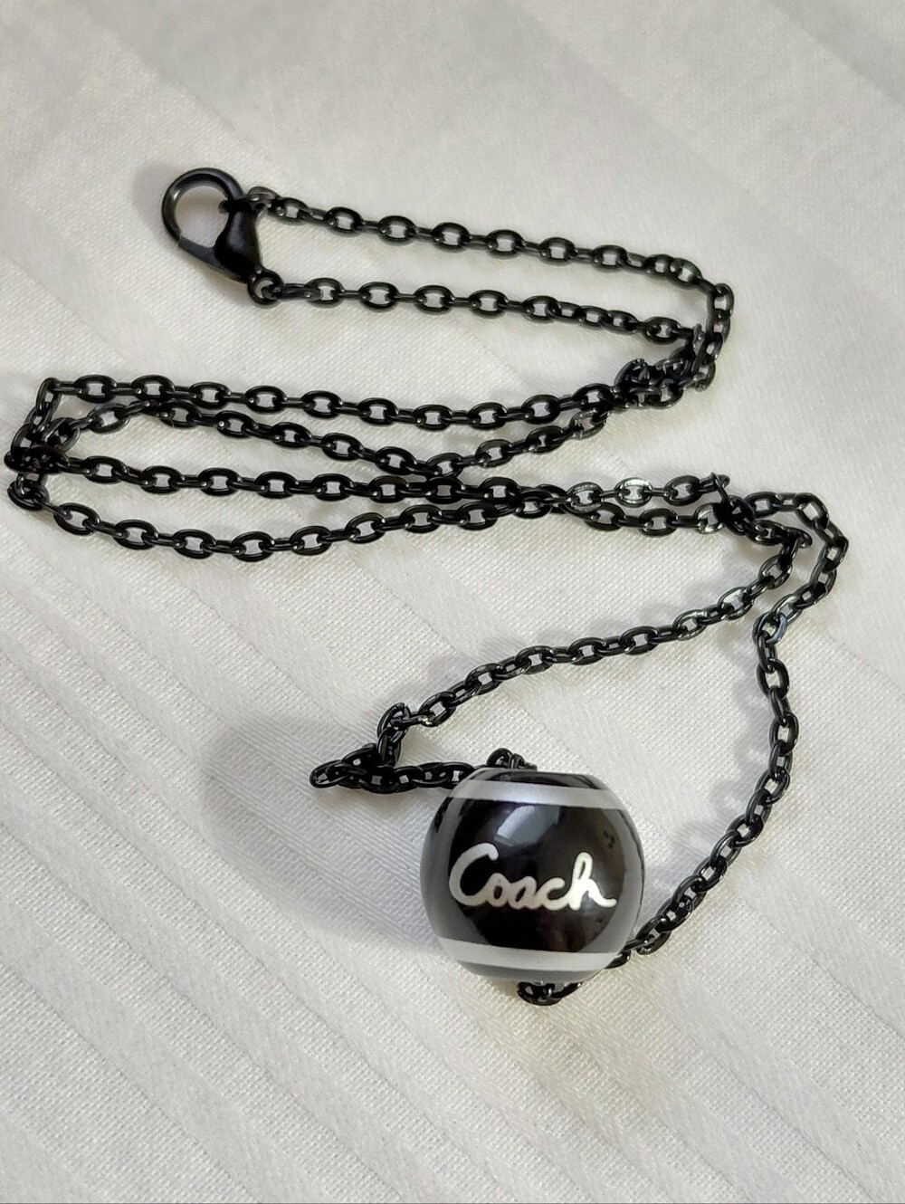 Coach Black Silver Charm Necklace